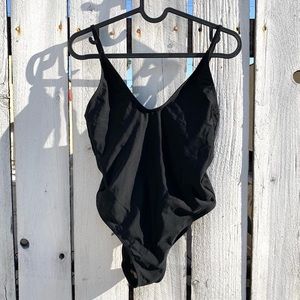 ASOS high leg black one piece swimsuit in a size 4